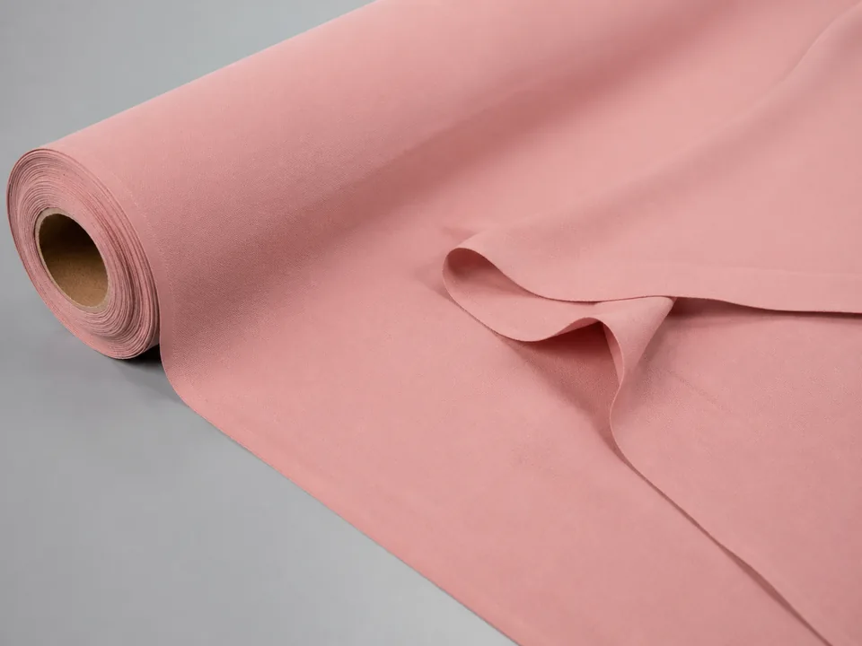 Dusty-rose dyed non-brushed plain-weave polyester fabric