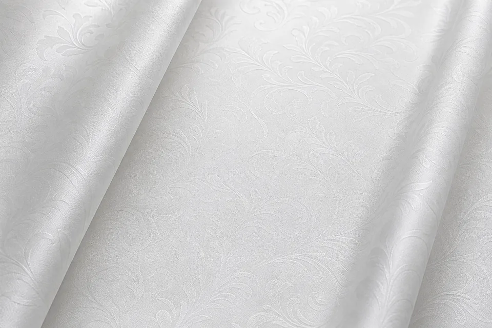 Lightly embossed polyester fabric