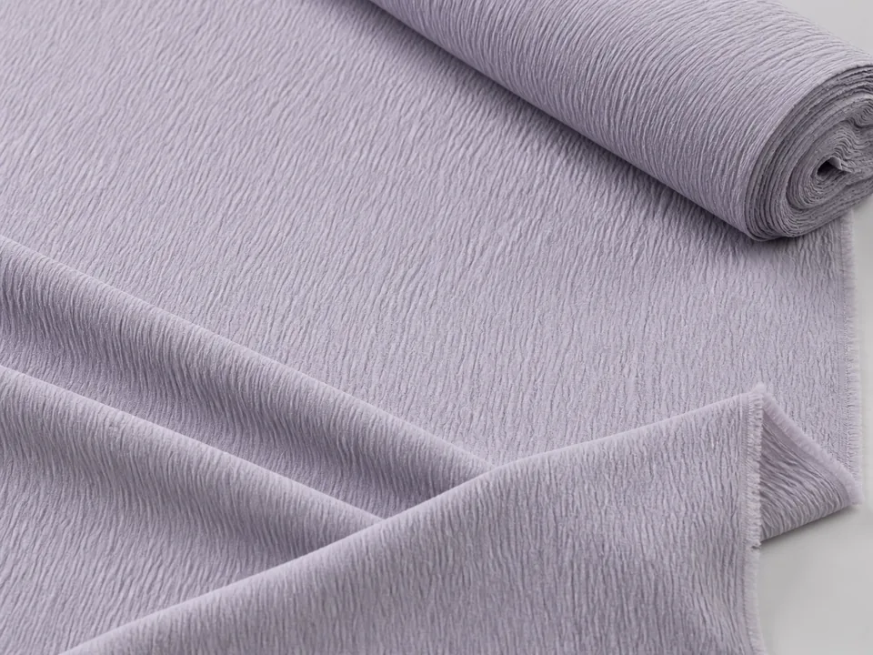 Lavender-grey mechanically crinkled brushed polyester fabric