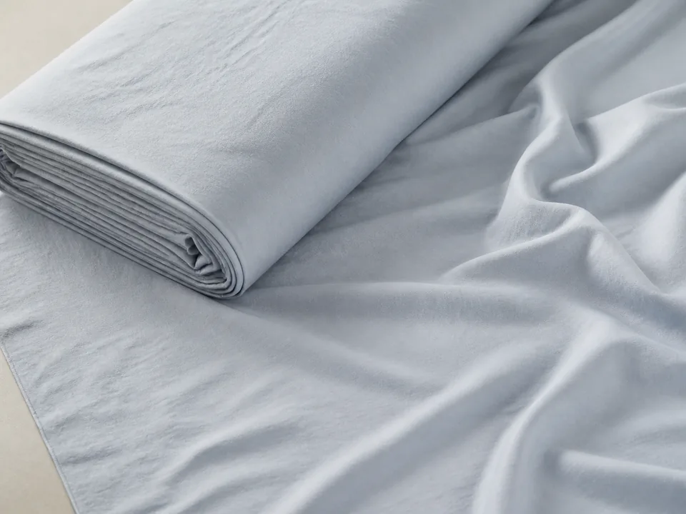 Mist-blue lightweight washed solid-dyed brushed polyester fabric
